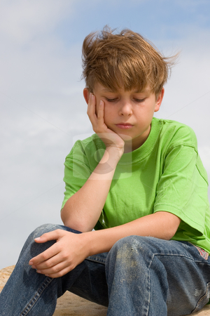 To use this stock image in your creative project, please select the size you need over to the right and click the "Add to Cart" button.
Your downloaded image will come with the Cutcaster watermark removed so don’t worry about the watermark you see on this page. Solemn Thoughts stock photo, A child sitting and thinking. by Leah-Anne Thompson