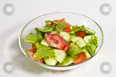 To use this stock image in your creative project, please select the size you need over to the right and click the "Add to Cart" button.
Your downloaded image will come with the Cutcaster watermark removed so don’t worry about the watermark you see on this page. Salad stock photo, Food series: healthy tomato and cucumber salad by Gennady Kravetsky