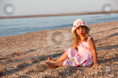 To use this stock image in your creative project, please select the size you need over to the right and click the "Add to Cart" button.
Your downloaded image will come with the Cutcaster watermark removed so don’t worry about the watermark you see on this page. Nice girl stock photo, People series: little girl in pink clothes by Gennady Kravetsky