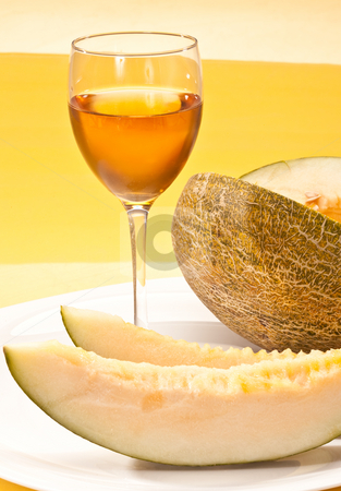 To use this stock image in your creative project, please select the size you need over to the right and click the "Add to Cart" button.
Your downloaded image will come with the Cutcaster watermark removed so don’t worry about the watermark you see on this page. Melon and wine stock photo, Food series: sliced melon and glass of wine by Gennady Kravetsky