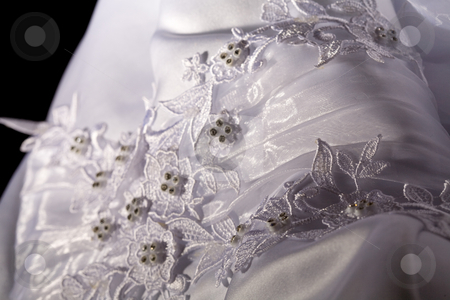 To use this stock image in your creative project, please select the size you need over to the right and click the "Add to Cart" button.
Your downloaded image will come with the Cutcaster watermark removed so don’t worry about the watermark you see on this page. Lace stock photo, Macro picture of lace on the wedding dress by Gennady Kravetsky