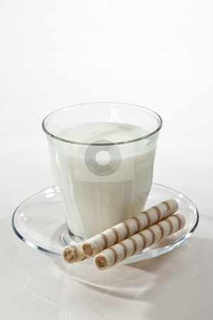 To use this stock image in your creative project, please select the size you need over to the right and click the "Add to Cart" button.
Your downloaded image will come with the Cutcaster watermark removed so don’t worry about the watermark you see on this page. Milk and pastry stock photo, Food series: glass with milk and pstry on white by Gennady Kravetsky