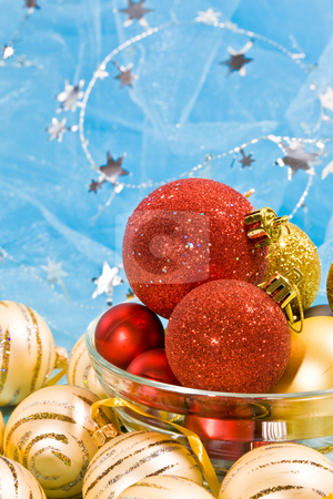 To use this stock image in your creative project, please select the size you need over to the right and click the "Add to Cart" button.
Your downloaded image will come with the Cutcaster watermark removed so don’t worry about the watermark you see on this page. Christmas decoration stock photo, Holiday series: christmas red and golden ball in bowl by Gennady Kravetsky