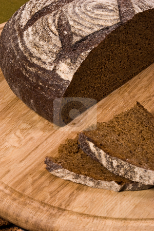 To use this stock image in your creative project, please select the size you need over to the right and click the "Add to Cart" button.
Your downloaded image will come with the Cutcaster watermark removed so don’t worry about the watermark you see on this page. Brown bread stock photo, Food series: round of brown tasty bread by Gennady Kravetsky