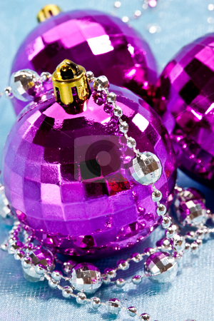 To use this stock image in your creative project, please select the size you need over to the right and click the "Add to Cart" button.
Your downloaded image will come with the Cutcaster watermark removed so don’t worry about the watermark you see on this page. Christmas decoration stock photo, Holiday series: christmas purple ball decoration and garland by Gennady Kravetsky