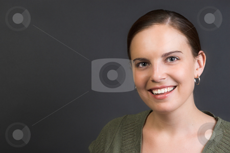 To use this stock image in your creative project, please select the size you need over to the right and click the "Add to Cart" button.
Your downloaded image will come with the Cutcaster watermark removed so don’t worry about the watermark you see on this page. Adult Model stock photo, Beautiful brunette female against a dark background by Carla Booysen