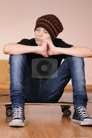 To use this stock image in your creative project, please select the size you need over to the right and click the "Add to Cart" button.
Your downloaded image will come with the Cutcaster watermark removed so don’t worry about the watermark you see on this page. The teenager with a skateboard stock photo, The teenager with a skateboard and in a hat by Salauyou Yury