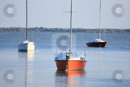 To use this stock image in your creative project, please select the size you need over to the right and click the "Add to Cart" button.
Your downloaded image will come with the Cutcaster watermark removed so don’t worry about the watermark you see on this page. Harmony stock photo, The sailboats is waiting in evening stillness by ARPAD RADOCZY