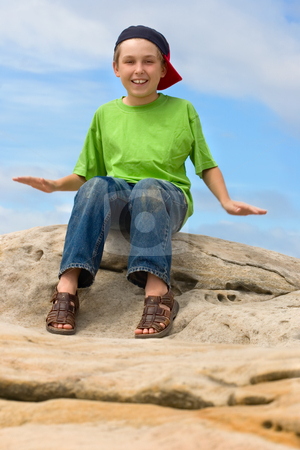 To use this stock image in your creative project, please select the size you need over to the right and click the "Add to Cart" button.
Your downloaded image will come with the Cutcaster watermark removed so don’t worry about the watermark you see on this page. Playful Child stock photo, A child outdoors having fun with happy expression. Movement in arms. by Leah-Anne Thompson