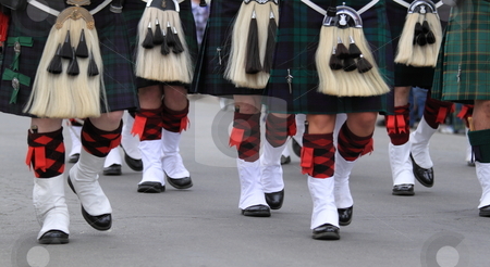 To use this stock image in your creative project, please select the size you need over to the right and click the "Add to Cart" button.
Your downloaded image will come with the Cutcaster watermark removed so don’t worry about the watermark you see on this page. English Uniforms stock photo, English uniforms at the with their bright colors by Henrik Lehnerer