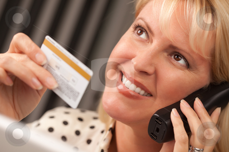 To use this stock image in your creative project, please select the size you need over to the right and click the "Add to Cart" button.
Your downloaded image will come with the Cutcaster watermark removed so don’t worry about the watermark you see on this page. Beautiful Woman on Phone Holding Credit Card stock photo, Beautiful Woman on the Phone Holding Her Credit Card. by Andy Dean