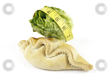 To use this stock image in your creative project, please select the size you need over to the right and click the "Add to Cart" button.
Your downloaded image will come with the Cutcaster watermark removed so don’t worry about the watermark you see on this page. Salad Lettace with Pasty and Tape Measure stock photo, Contradiction between healthy food and junk food using a green salad lettace and pasty with a yellow tape measure on a reflective white background by Keith Wilson