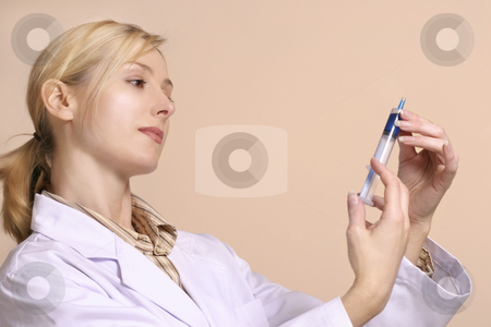 To use this stock image in your creative project, please select the size you need over to the right and click the "Add to Cart" button.
Your downloaded image will come with the Cutcaster watermark removed so don’t worry about the watermark you see on this page. Healthcare stock photo, Healthcare worker with a syringe by Leah-Anne Thompson