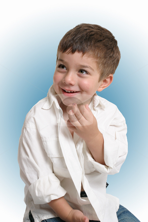 To use this stock image in your creative project, please select the size you need over to the right and click the "Add to Cart" button.
Your downloaded image will come with the Cutcaster watermark removed so don’t worry about the watermark you see on this page. Toddler with happy smile stock photo, Beautiful young boy with a gorgeous smile - blue background by Leah-Anne Thompson