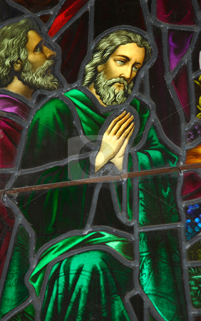 To use this stock image in your creative project, please select the size you need over to the right and click the "Add to Cart" button.
Your downloaded image will come with the Cutcaster watermark removed so don’t worry about the watermark you see on this page. Stained Glass Church Window stock photo, Stained glass leadlight window. circa 1870-1900 depicting a prayer. Window shows some age. by Leah-Anne Thompson
