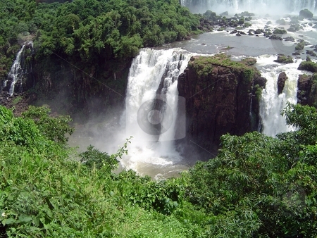 To use this stock image in your creative project, please select the size you need over to the right and click the "Add to Cart" button.
Your downloaded image will come with the Cutcaster watermark removed so don’t worry about the watermark you see on this page. Iguazu falls stock photo, by Giancarlo Liguori