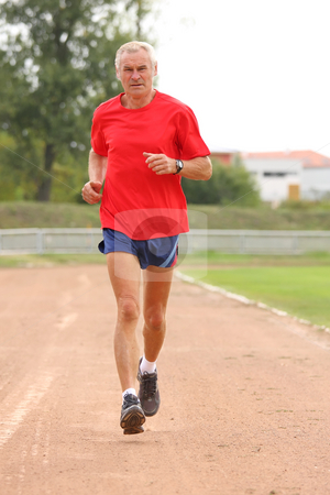 To use this stock image in your creative project, please select the size you need over to the right and click the "Add to Cart" button.
Your downloaded image will come with the Cutcaster watermark removed so don’t worry about the watermark you see on this page. Senior runner stock photo, Senior runner while training for a competition by ARPAD RADOCZY