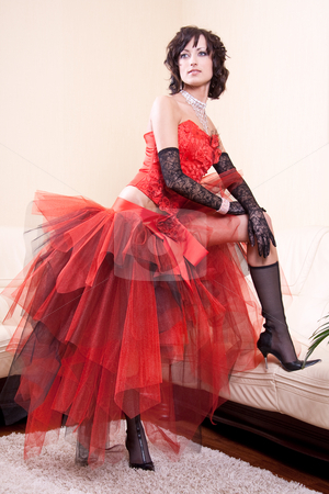 To use this stock image in your creative project, please select the size you need over to the right and click the "Add to Cart" button.
Your downloaded image will come with the Cutcaster watermark removed so don’t worry about the watermark you see on this page. Woman in a red dress stock photo, Woman in a red dress posing in the interior by Artem Zamula