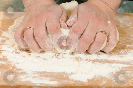 To use this stock image in your creative project, please select the size you need over to the right and click the "Add to Cart" button.
Your downloaded image will come with the Cutcaster watermark removed so don’t worry about the watermark you see on this page. Dough stock photo, Preparation of the dough for a baking of rolls by Salauyou Yury