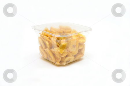 To use this stock image in your creative project, please select the size you need over to the right and click the "Add to Cart" button.
Your downloaded image will come with the Cutcaster watermark removed so don’t worry about the watermark you see on this page. Dried Banana Chips stock photo, Sliced and dried bananas in a clear airtight plastic container on a white background by Lynn Bendickson