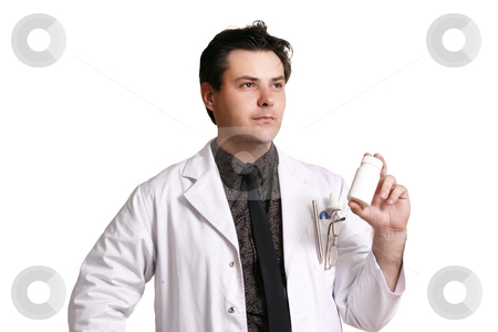 To use this stock image in your creative project, please select the size you need over to the right and click the "Add to Cart" button.
Your downloaded image will come with the Cutcaster watermark removed so don’t worry about the watermark you see on this page. Doctor or pharmacist with a product stock photo, A doctor or pharmacist holding or recommending a medicine or supplement. by Leah-Anne Thompson
