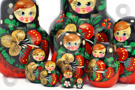 To use this stock image in your creative project, please select the size you need over to the right and click the "Add to Cart" button.
Your downloaded image will come with the Cutcaster watermark removed so don’t worry about the watermark you see on this page. Bright wooden dolls stock photo, Multi-coloured bright wooden Russian children's toys of a doll. by Aleksandr Volokov