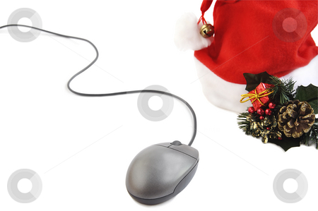 To use this stock image in your creative project, please select the size you need over to the right and click the "Add to Cart" button.
Your downloaded image will come with the Cutcaster watermark removed so don’t worry about the watermark you see on this page. Christmas time. stock photo, Computer mouse with Santa hat and holiday decoration isolated over white. by Liana Bukhtyyarova