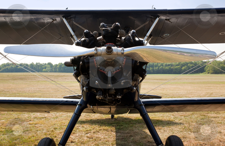 To use this stock image in your creative project, please select the size you need over to the right and click the "Add to Cart" button.
Your downloaded image will come with the Cutcaster watermark removed so don’t worry about the watermark you see on this page. Propeller and engine of old biplane stock photo, Close up of the engine and propellor of antique biplane by Steven Heap