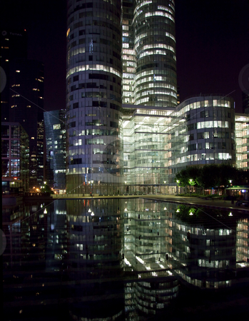 To use this stock image in your creative project, please select the size you need over to the right and click the "Add to Cart" button.
Your downloaded image will come with the Cutcaster watermark removed so don’t worry about the watermark you see on this page. Reflection of La Defense Office buildings at night stock photo, Modern skycraper office buildings reflected at night at La Defense in Paris by Steven Heap