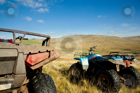 To use this stock image in your creative project, please select the size you need over to the right and click the "Add to Cart" button.
Your downloaded image will come with the Cutcaster watermark removed so don’t worry about the watermark you see on this page. ATV quad bikes on Snowdonia mountain stock photo, Off road quad bikes on mountainside in remote Welsh valley by Steven Heap