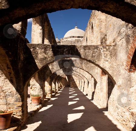 To use this stock image in your creative project, please select the size you need over to the right and click the "Add to Cart" button.
Your downloaded image will come with the Cutcaster watermark removed so don’t worry about the watermark you see on this page. Arches of San Jan Mission near San Antonio stock photo, View of the arches leading to the San Juan Mission in San Antonio by Steven Heap