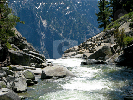 To use this stock image in your creative project, please select the size you need over to the right and click the "Add to Cart" button.
Your downloaded image will come with the Cutcaster watermark removed so don’t worry about the watermark you see on this page. River dropping off edge of Yosemite Falls stock photo, Rushing river at top of Yosemite Falls prior to drop by Steven Heap