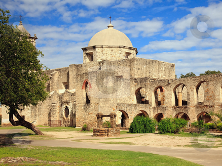 To use this stock image in your creative project, please select the size you need over to the right and click the "Add to Cart" button.
Your downloaded image will come with the Cutcaster watermark removed so don’t worry about the watermark you see on this page. San Juan Mission in Texas stock photo, View of the garden and well in front of the San Juan Mission near San Antonio in Texas by Steven Heap