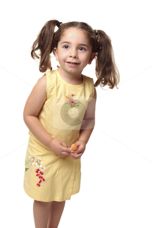 To use this stock image in your creative project, please select the size you need over to the right and click the "Add to Cart" button.
Your downloaded image will come with the Cutcaster watermark removed so don’t worry about the watermark you see on this page. Smiling toddler holding a candy stock photo, Cute toddler girl with natural wavy hair pulled into ponytails. She is wearing a yellow outfit with embroidery and is holding a lollipop candy on a stick. by Leah-Anne Thompson