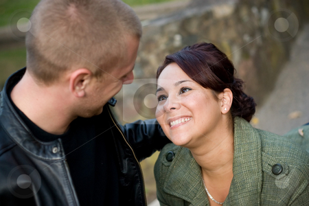 To use this stock image in your creative project, please select the size you need over to the right and click the "Add to Cart" button.
Your downloaded image will come with the Cutcaster watermark removed so don’t worry about the watermark you see on this page. Young Couple Dating stock photo, A young happy couple looking fondly at one another outdoors. Shallow depth of filed with focus in the woman. by Todd Arena