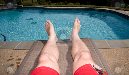 To use this stock image in your creative project, please select the size you need over to the right and click the "Add to Cart" button.
Your downloaded image will come with the Cutcaster watermark removed so don’t worry about the watermark you see on this page. Legs overhanging pool stock photo, Middle aged man's legs overhanging blue swimming pool by Steven Heap