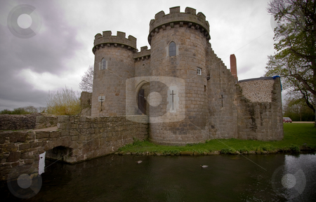 To use this stock image in your creative project, please select the size you need over to the right and click the "Add to Cart" button.
Your downloaded image will come with the Cutcaster watermark removed so don’t worry about the watermark you see on this page. Whittington Castle stock photo, Whittington Castle in Shropshire reflected in moat with cloudy sky by Steven Heap