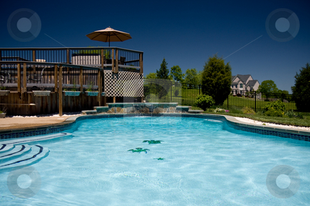 To use this stock image in your creative project, please select the size you need over to the right and click the "Add to Cart" button.
Your downloaded image will come with the Cutcaster watermark removed so don’t worry about the watermark you see on this page. Water level view of pool and deck stock photo, View of a backyard swimming pool with a deck taken from the water level by Steven Heap