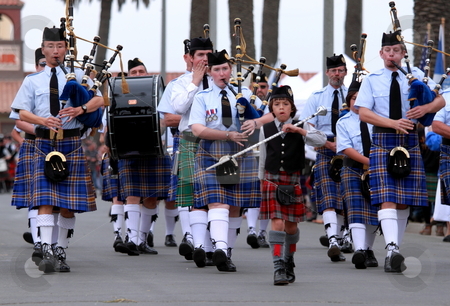To use this stock image in your creative project, please select the size you need over to the right and click the "Add to Cart" button.
Your downloaded image will come with the Cutcaster watermark removed so don’t worry about the watermark you see on this page. Seaside Highland Games stock photo, VENTURA, CA, USA - October 11, 2009 - Bagpipe bands participating in a parade at the Ventura Seaside Highland Games October 11, 2009 in Ventura, CA by Henrik Lehnerer