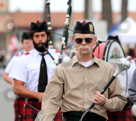 To use this stock image in your creative project, please select the size you need over to the right and click the "Add to Cart" button.
Your downloaded image will come with the Cutcaster watermark removed so don’t worry about the watermark you see on this page. Seaside Highland Games stock photo, VENTURA, CA, USA - October 11, 2009 - Bagpipe bands participating in a parade at the Ventura Seaside Highland Games October 11, 2009 in Ventura, CA by Henrik Lehnerer