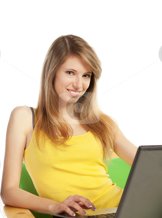 To use this stock image in your creative project, please select the size you need over to the right and click the "Add to Cart" button.
Your downloaded image will come with the Cutcaster watermark removed so don’t worry about the watermark you see on this page. Young blond woman with computer stock photo, Young blond pretty woman sitting on sofa with laptop computer; isolated on white by Mikhail Lavrenov