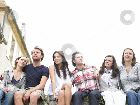 To use this stock image in your creative project, please select the size you need over to the right and click the "Add to Cart" button.
Your downloaded image will come with the Cutcaster watermark removed so don’t worry about the watermark you see on this page. Group of Friends Outdoors, Looking Into the Distance stock photo, Group of young people sitting together outdoors, looking away into the distance. Horizontal. by Mog Ddl