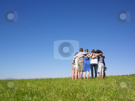 To use this stock image in your creative project, please select the size you need over to the right and click the "Add to Cart" button.
Your downloaded image will come with the Cutcaster watermark removed so don’t worry about the watermark you see on this page. Group of People in Huddle in Field stock photo, A group of people huddle in a field. Horizontally framed shot. by Mog Ddl