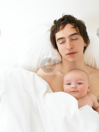To use this stock image in your creative project, please select the size you need over to the right and click the "Add to Cart" button.
Your downloaded image will come with the Cutcaster watermark removed so don’t worry about the watermark you see on this page. Father and baby sleeping stock photo, Father and baby sleeping together in a bed by Mog Ddl