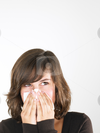 To use this stock image in your creative project, please select the size you need over to the right and click the "Add to Cart" button.
Your downloaded image will come with the Cutcaster watermark removed so don’t worry about the watermark you see on this page. Young Woman Blowing Nose stock photo, Young woman with cold blowing nose. Vertically framed shot. by Mog Ddl