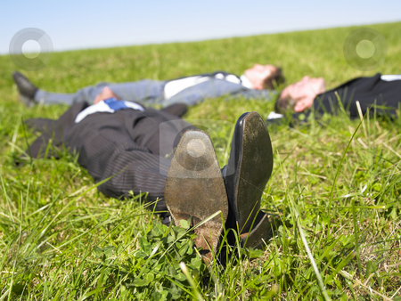 To use this stock image in your creative project, please select the size you need over to the right and click the "Add to Cart" button.
Your downloaded image will come with the Cutcaster watermark removed so don’t worry about the watermark you see on this page. Businessmen Lying in the Grass stock photo, Three businessmen lying in the grass. Horizontal. by Mog Ddl