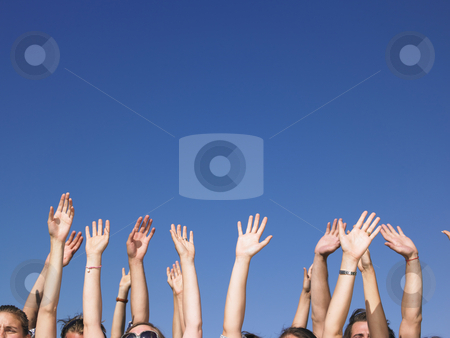 To use this stock image in your creative project, please select the size you need over to the right and click the "Add to Cart" button.
Your downloaded image will come with the Cutcaster watermark removed so don’t worry about the watermark you see on this page. People With Arms Raised stock photo, People with hands in the air, with only the tops of their faces visible. Horizontal. by Mog Ddl