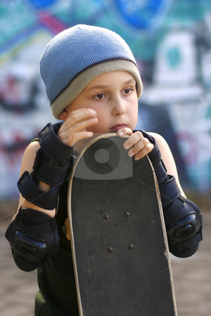 To use this stock image in your creative project, please select the size you need over to the right and click the "Add to Cart" button.
Your downloaded image will come with the Cutcaster watermark removed so don’t worry about the watermark you see on this page. Child with skateboard stock photo, A boy with his skateboard waits his turn by Leah-Anne Thompson