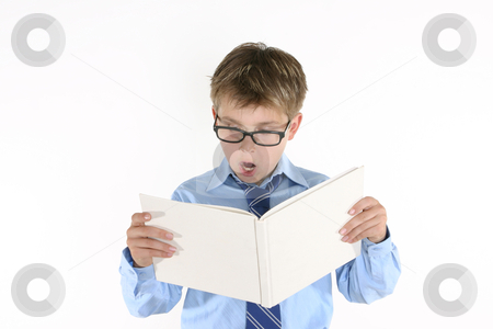 To use this stock image in your creative project, please select the size you need over to the right and click the "Add to Cart" button.
Your downloaded image will come with the Cutcaster watermark removed so don’t worry about the watermark you see on this page. Child student reading a book stock photo, Student or child reading a book by Leah-Anne Thompson