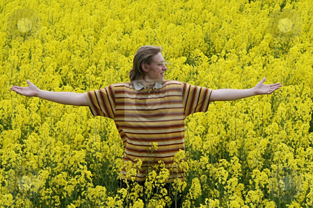To use this stock image in your creative project, please select the size you need over to the right and click the "Add to Cart" button.
Your downloaded image will come with the Cutcaster watermark removed so don’t worry about the watermark you see on this page. Young man in meadow stock photo, Happy and smiling young man in the yellow flower meadow. by Roberts Ratuts